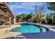 Inviting kidney shaped pool in a sunny backyard at 537 W El Caminito Dr, Phoenix, AZ 85021