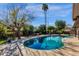 Relaxing kidney shaped pool and patio at 537 W El Caminito Dr, Phoenix, AZ 85021