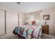 Cozy bedroom with a queen-size bed and built-in closet at 5646 E Player Pl, Mesa, AZ 85215