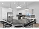 Modern kitchen with white cabinets and granite island at 5714 E Paradise Ln, Scottsdale, AZ 85254