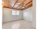 Bright bedroom with tile flooring and ceiling fan at 6026 W Juniper Ave, Glendale, AZ 85306