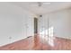 Bedroom with wood flooring and double closets at 6026 W Juniper Ave, Glendale, AZ 85306