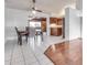 Dining room with hardwood floors and kitchen access at 6026 W Juniper Ave, Glendale, AZ 85306