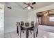 Casual dining area with dark wood table and four chairs at 6026 W Juniper Ave, Glendale, AZ 85306