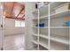 Well-organized pantry with ample shelving at 6026 W Juniper Ave, Glendale, AZ 85306