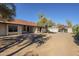 Spacious backyard with covered patio and gravel at 605 S 30Th Cir, Mesa, AZ 85204