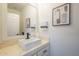 Stylish powder room with modern vanity and fixtures at 605 S 30Th Cir, Mesa, AZ 85204