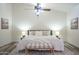 Large bedroom with a king-size bed and neutral decor at 605 S 30Th Cir, Mesa, AZ 85204