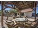 Relaxing patio with covered seating area at 605 S 30Th Cir, Mesa, AZ 85204