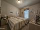 Guest bedroom with two twin beds at 650 N Hawes Rd # 4430, Mesa, AZ 85207