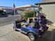 Blue golf cart with golf clubs, ready for the course at 650 N Hawes Rd # 4430, Mesa, AZ 85207