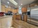 Bright kitchen with stainless steel appliances and wood cabinets at 650 N Hawes Rd # 4430, Mesa, AZ 85207