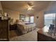 Spacious main bedroom with ceiling fan and ample closet space at 650 N Hawes Rd # 4430, Mesa, AZ 85207