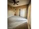 Spacious bedroom with tile floors and ceiling fan at 6508 N 24Th Ln, Phoenix, AZ 85015