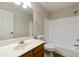 Clean bathroom with a bathtub, toilet and sink at 6602 W Prickly Pear Trl, Phoenix, AZ 85083