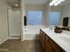 Double vanity bathroom with soaking tub and shower at 6602 W Prickly Pear Trl, Phoenix, AZ 85083