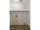 Laundry room with tile floor and shelving at 6602 W Prickly Pear Trl, Phoenix, AZ 85083