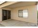 Covered patio with sliding glass door and window at 6602 W Prickly Pear Trl, Phoenix, AZ 85083