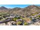 Aerial view showcasing home's location in a mountainside neighborhood at 6857 W Juana Dr, Peoria, AZ 85383