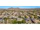 Aerial view of home and neighborhood with mountain views at 6857 W Juana Dr, Peoria, AZ 85383