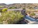 Aerial view of house and driveway, nestled in the foothills at 6857 W Juana Dr, Peoria, AZ 85383