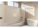 Clean bathroom with shower/tub combo and updated fixtures at 6857 W Juana Dr, Peoria, AZ 85383