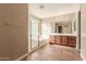 Bathroom boasts a soaking tub, double vanity, and tile floors at 6857 W Juana Dr, Peoria, AZ 85383