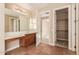 Bathroom features a double vanity and a large closet at 6857 W Juana Dr, Peoria, AZ 85383