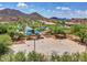 Community park with playground, basketball court, and shaded seating areas at 6857 W Juana Dr, Peoria, AZ 85383