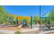 playground with slides, climbing structures, and shade sails at 6857 W Juana Dr, Peoria, AZ 85383