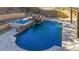 Relaxing pool and spa area with a rock waterfall at 6857 W Juana Dr, Peoria, AZ 85383