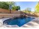 Inviting pool and spa with a waterfall feature at 6857 W Juana Dr, Peoria, AZ 85383