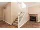 Elegant staircase with white railing leading to the second floor at 6857 W Juana Dr, Peoria, AZ 85383