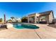 Inviting kidney-shaped pool with surrounding patio at 6902 S 14Th Dr, Phoenix, AZ 85041