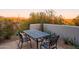 Relaxing patio with table, chairs, and mountain views at 7002 E Leisure Ln, Carefree, AZ 85377