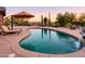 Stunning pool and spa with mountain backdrop at 7002 E Leisure Ln, Carefree, AZ 85377