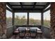 Sunroom dining area with mountain views at 7002 E Leisure Ln, Carefree, AZ 85377