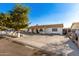 House exterior with front yard and driveway at 7135 W Heatherbrae Dr, Phoenix, AZ 85033