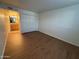 Bright bedroom with wood flooring and built-in closet at 740 W Elm St # 119, Phoenix, AZ 85013