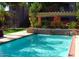 Refreshing community pool with a relaxing waterfall feature at 740 W Elm St # 119, Phoenix, AZ 85013