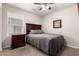 Bedroom with a full bed and dark brown nightstand at 790 W Jardin Dr, Casa Grande, AZ 85122