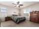 Bright bedroom with a double bed and wooden dresser at 790 W Jardin Dr, Casa Grande, AZ 85122