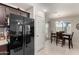 Kitchen with black appliances and granite countertops at 790 W Jardin Dr, Casa Grande, AZ 85122