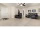 Living room with leather seating and tile flooring at 790 W Jardin Dr, Casa Grande, AZ 85122