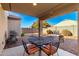 Relaxing patio area with table and chairs, perfect for outdoor dining at 790 W Jardin Dr, Casa Grande, AZ 85122