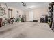 Garage with storage shelving and bicycles at 8047 W Cinder Brook Way, Florence, AZ 85132