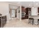 Bright kitchen boasts an open layout and views into a hallway at 8047 W Cinder Brook Way, Florence, AZ 85132