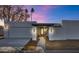 Modern home exterior with a walkway and attached garage at 8165 E Del Cuarzo Dr, Scottsdale, AZ 85258