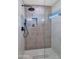 Modern shower with sleek fixtures and neutral-toned tile at 8165 E Del Cuarzo Dr, Scottsdale, AZ 85258