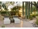 Relaxing backyard patio with comfortable seating and desert landscaping at 8255 E Vista De Valle --, Scottsdale, AZ 85255